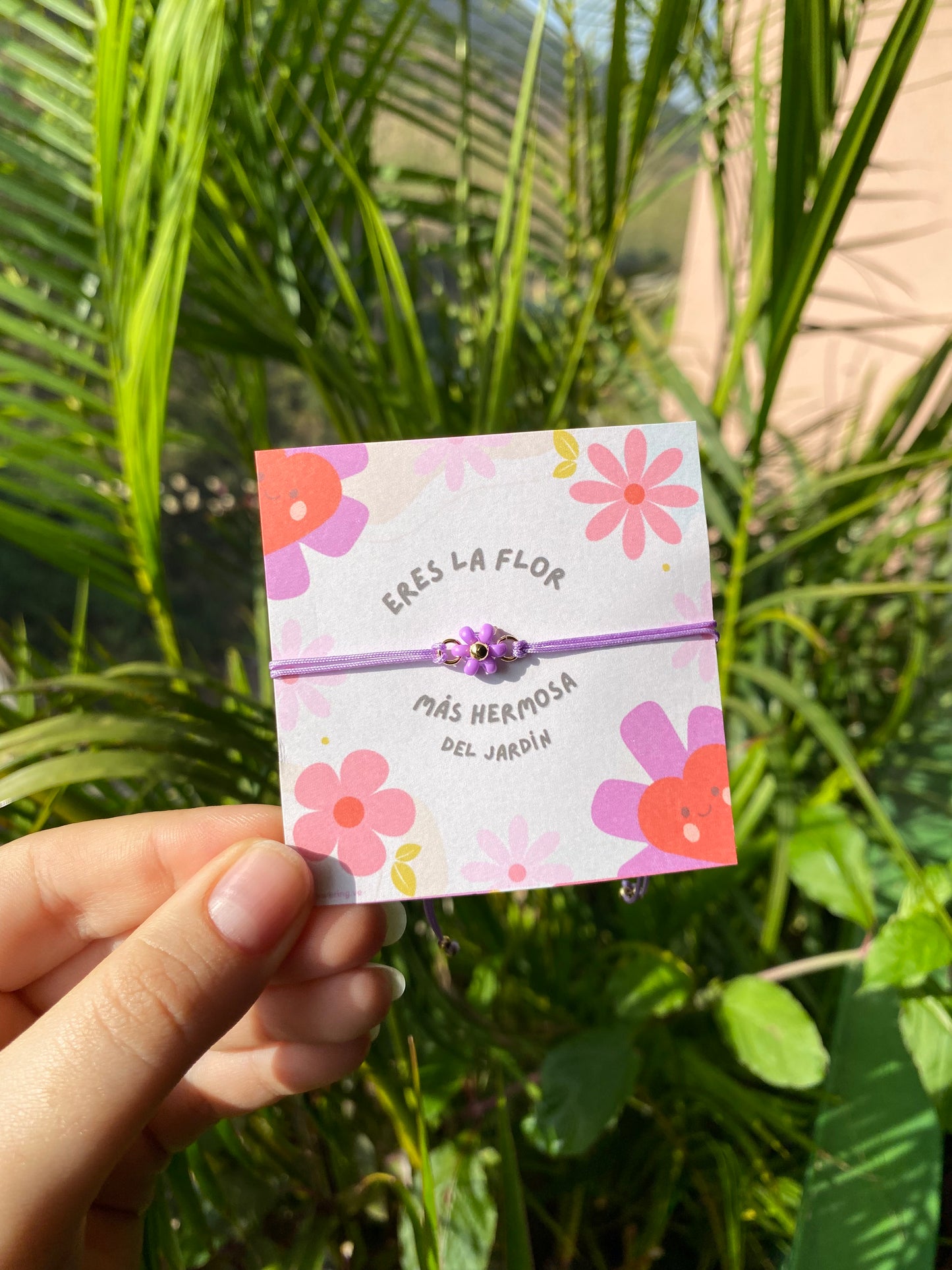 Thread bracelet with flower